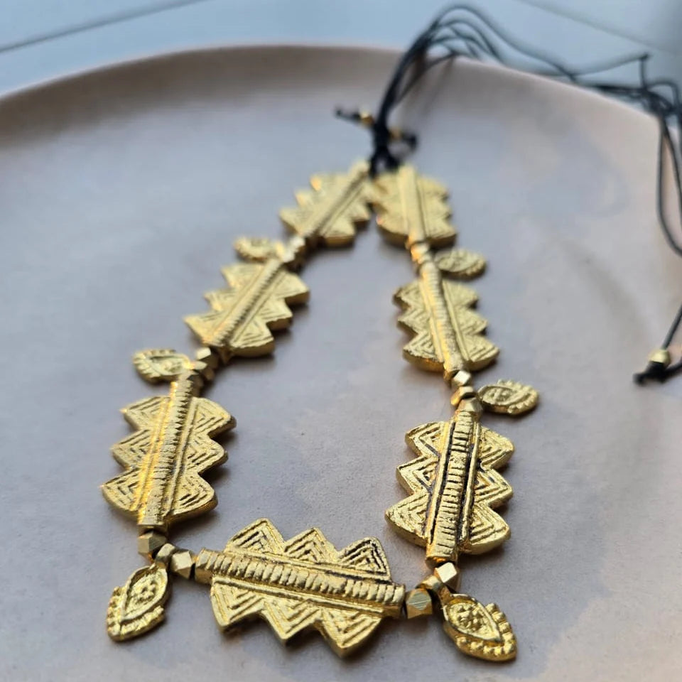 Sun-kissed brass choker